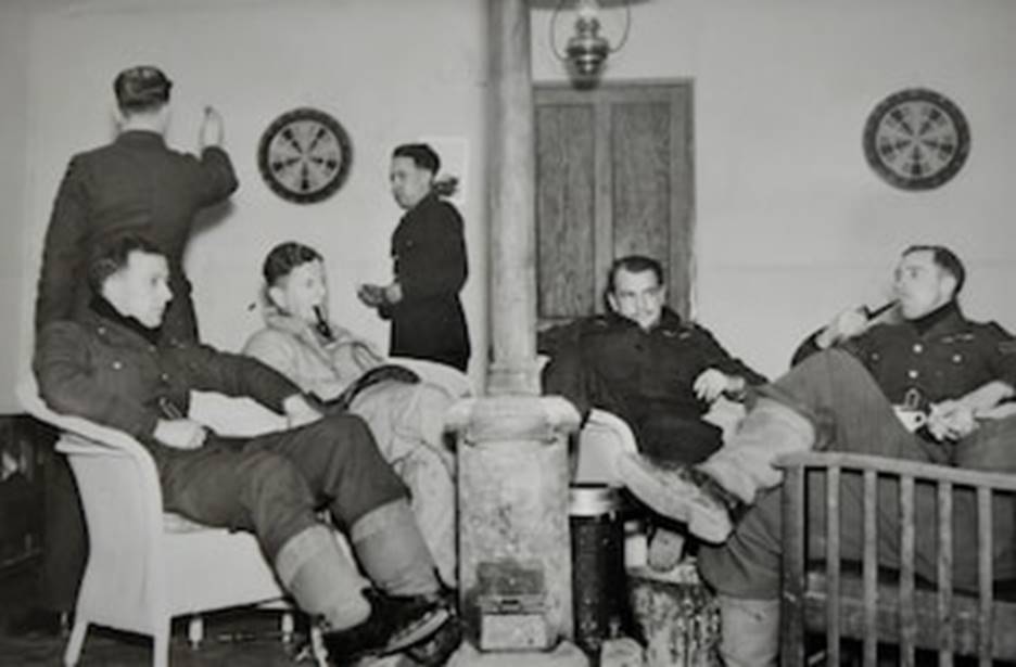 Hemingway, second right, with fellow airmen