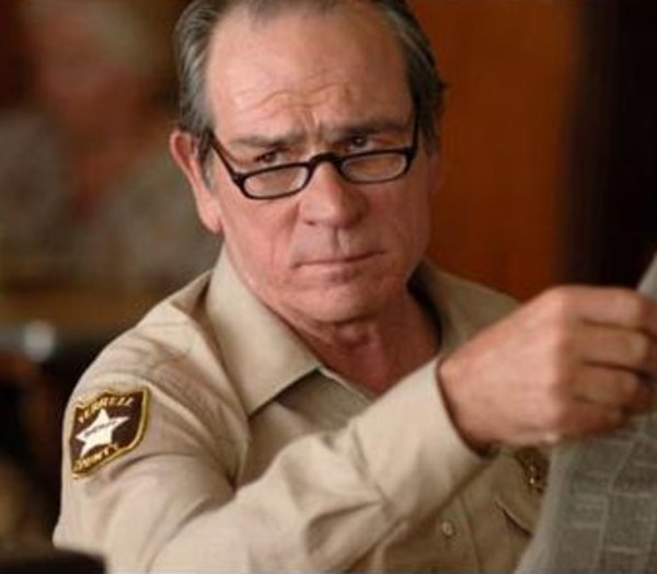 Tommy Lee Jones With A Newspaper | Know Your Meme